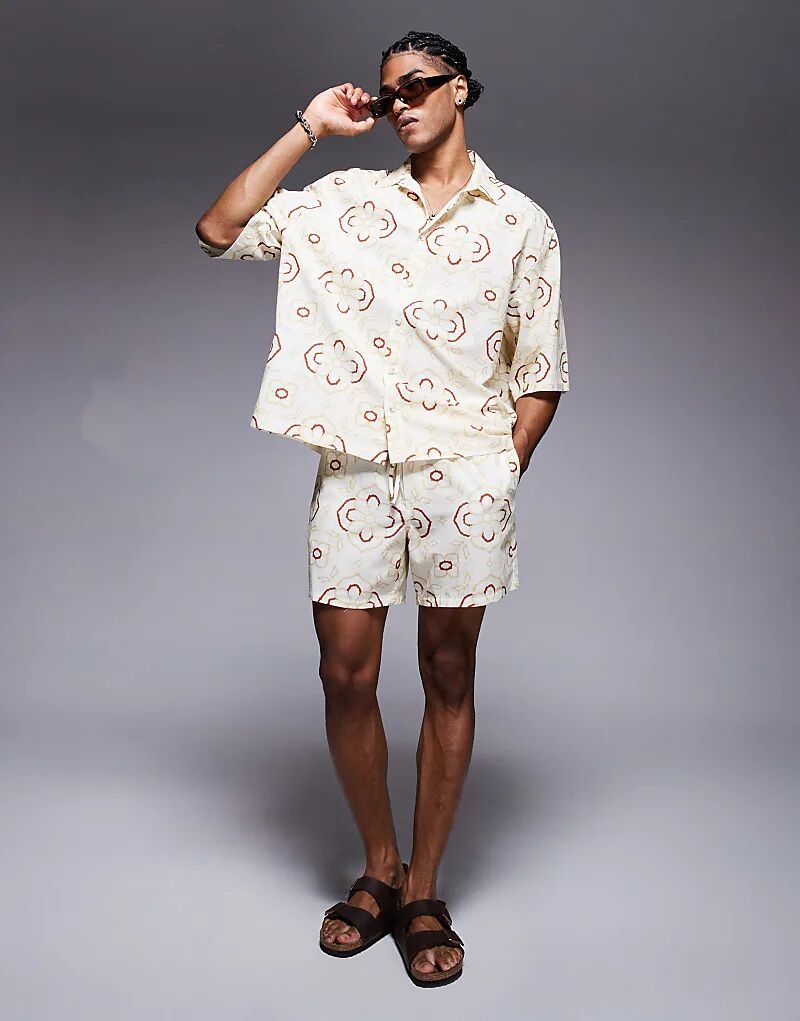 Шорты ASOS DESIGN средней длины с геометрическим принтом бежевого цвета
Шорты ASOS DESIGN средней длины с геометрическим принтом бежевого цвета