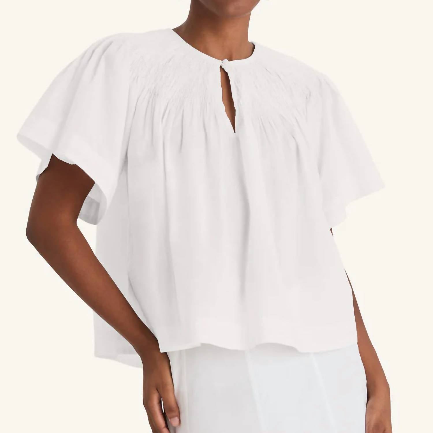 Топ Mavis с рукавами-крылышками в белом цвете Merlette
Топ Mavis с рукавами-крылышками в белом цвете Merlette