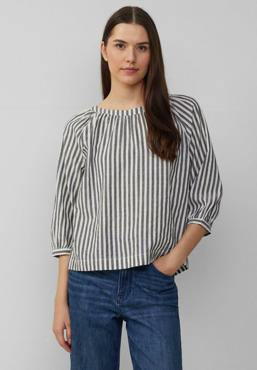 Блуза s.Oliver MIT RAFFUNG UND SCHLEIFE, Schwarz/Black
Блуза s.Oliver MIT RAFFUNG UND SCHLEIFE, Schwarz/Black