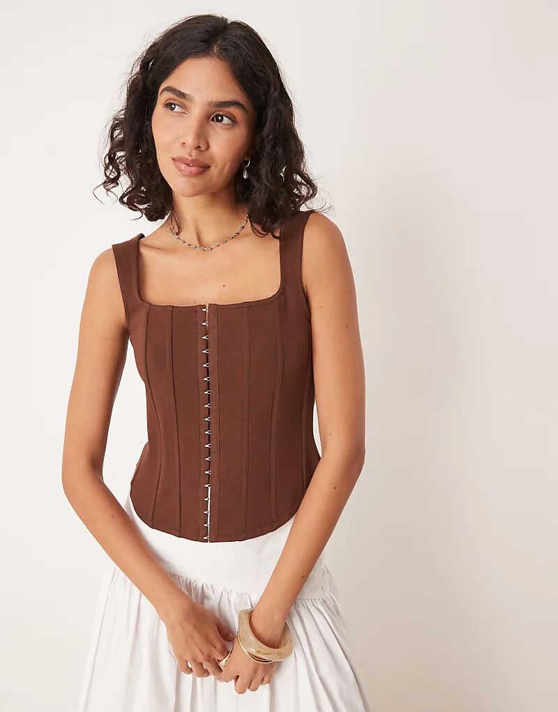 Корсетный топ ASOS DESIGN с люверсами спереди шоколадного цвета
Корсетный топ ASOS DESIGN с люверсами спереди шоколадного цвета