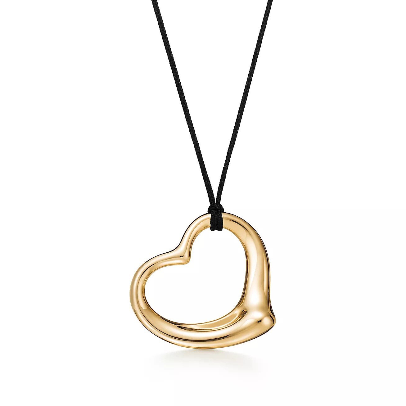 Колье Tiffany & Co. x Elsa Peretti Open Heart, золото/черный шелк
Колье Tiffany & Co. x Elsa Peretti Open Heart, золото/черный шелк