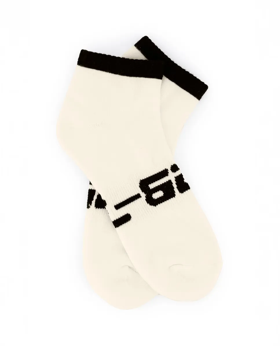 Короткие хлопковые носки кремового и черного цвета Black Limba, кремовый
Короткие хлопковые носки кремового и черного цвета Black Limba, кремовый