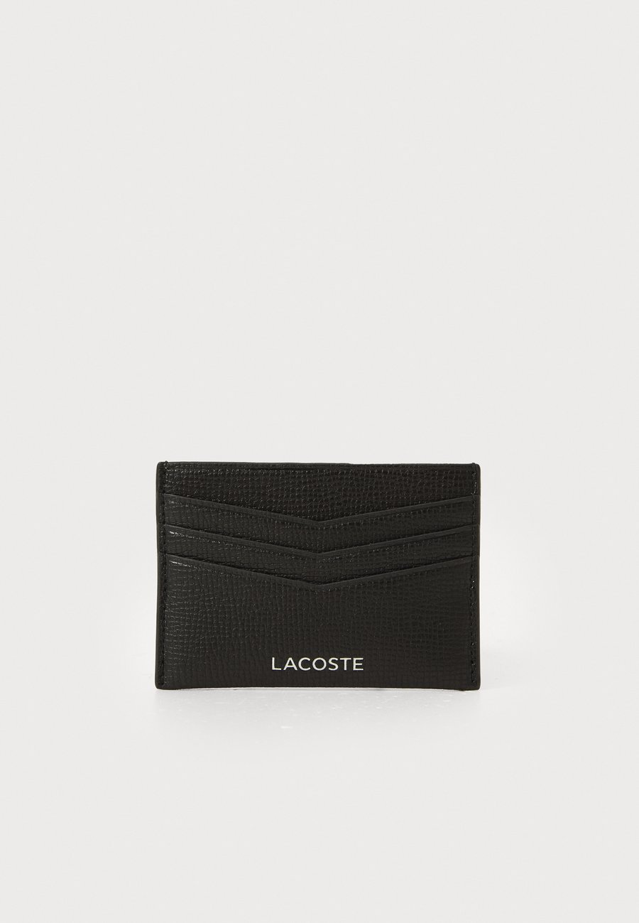 Кошелек Lacoste MONEY PIECES, Noir/Black
Кошелек Lacoste MONEY PIECES, Noir/Black