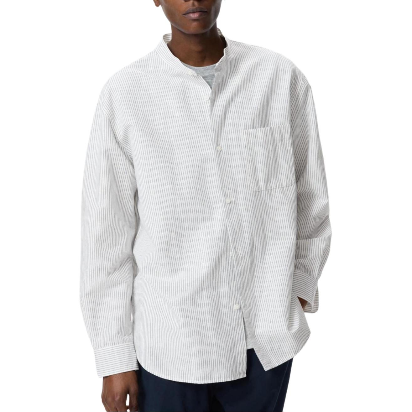 UNIQLO Рубашка унисекс цвета слоновой кости
UNIQLO Рубашка унисекс цвета слоновой кости