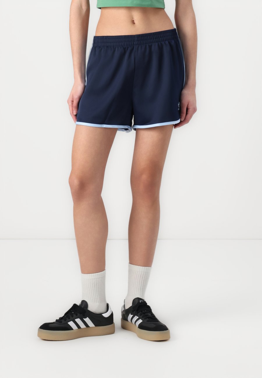 Шорты Adidas Originals SPRINTER, Night Indigo/Dark Blue
Шорты Adidas Originals SPRINTER, Night Indigo/Dark Blue