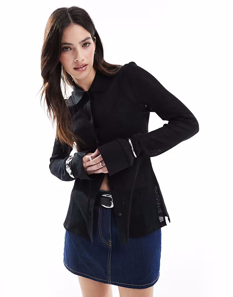 ONLY трикотажная рубашка с рукавами-флейтами черного цвета
ONLY трикотажная рубашка с рукавами-флейтами черного цвета