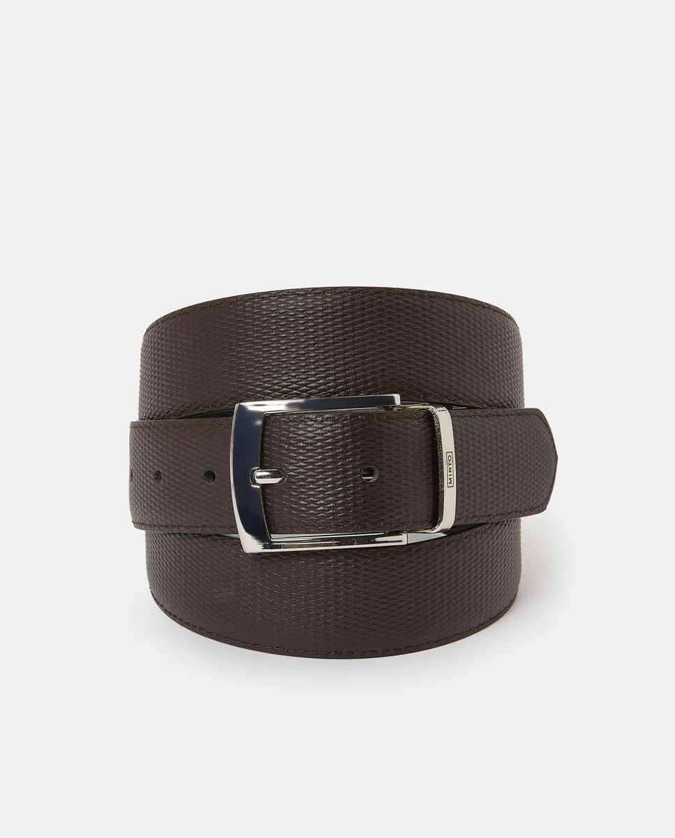 Двусторонний резной кожаный ремень больших размеров Mirto, черный
Двусторонний резной кожаный ремень больших размеров Mirto, черный