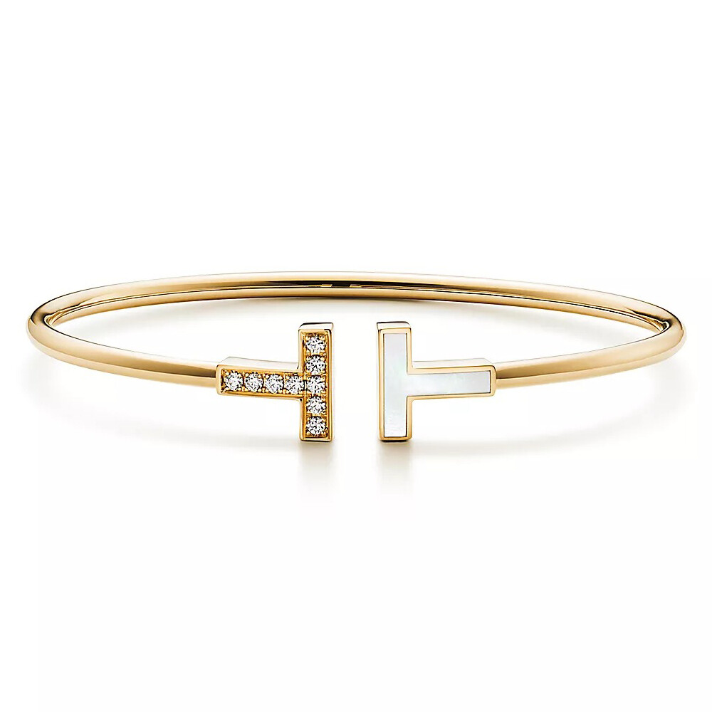 Браслет Tiffany & Co Tiffany T Wire, золото/бриллиант/перламутр
Браслет Tiffany & Co Tiffany T Wire, золото/бриллиант/перламутр
