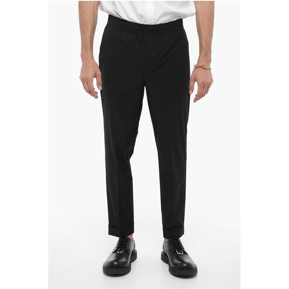 Нейлоновые брюки REM с эластичным поясом Neil Barrett, Black
Нейлоновые брюки REM с эластичным поясом Neil Barrett, Black