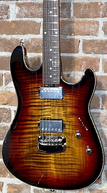 Электрогитара 2022 Music Man Sabre Guitar HH Trem Flame Maple Bougie Burst w/Roasted Figured Maple Neck, AMAZING !
Электрогитара 2022 Music Man Sabre Guitar HH Trem Flame Maple Bougie Burst w/Roasted Figured Maple Neck, AMAZING !