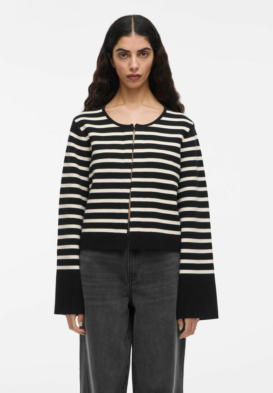 Кардиган Rouge Edit Cardigan, Meteorite/Anthracite
Кардиган Rouge Edit Cardigan, Meteorite/Anthracite