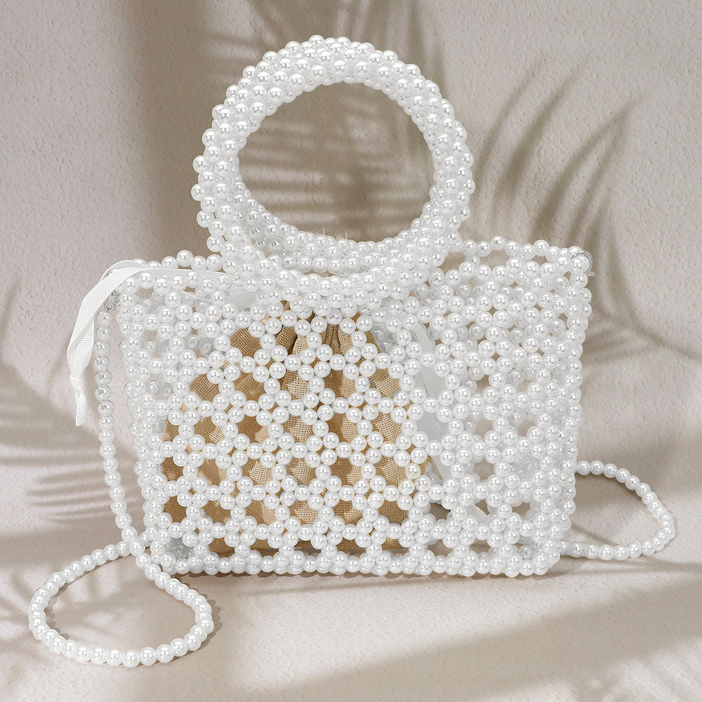 Элегантная сумка через плечо с жемчужным бисером, круглой ручкой и решетчатым дизайном FASHNZFAB, белый
Элегантная сумка через плечо с жемчужным бисером, круглой ручкой и решетчатым дизайном FASHNZFAB, белый