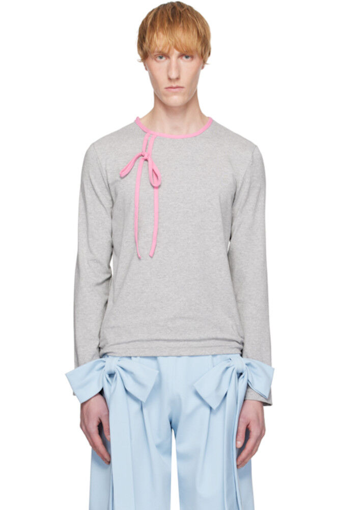 Трикотажный топ с серо-розовой отделкой бантом ANDREJ GRONAU
Трикотажный топ с серо-розовой отделкой бантом ANDREJ GRONAU