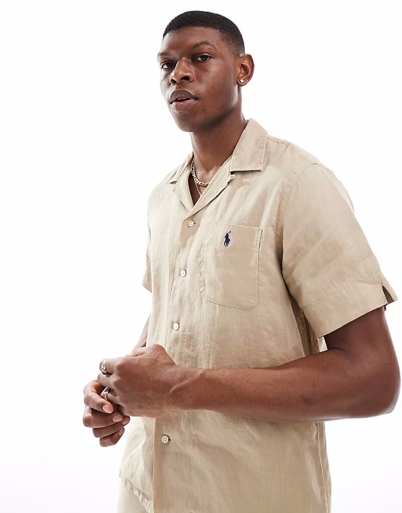 Льняная рубашка Polo Ralph Lauren с короткими рукавами и воротником-стойкой, классического свободного кроя бежевого цвета CO-ORD
Льняная рубашка Polo Ralph Lauren с короткими рукавами и воротником-стойкой, классического свободного кроя бежевого цвета CO-ORD