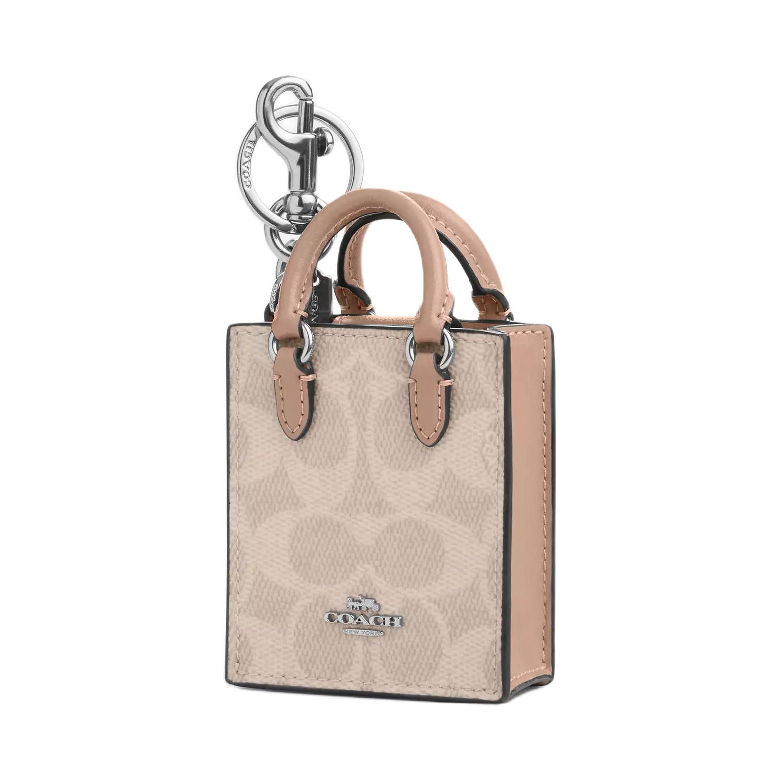 COACH Миниатюрный чехол для наушников из лакированного полотна женский бежевый, Beige
COACH Миниатюрный чехол для наушников из лакированного полотна женский бежевый, Beige