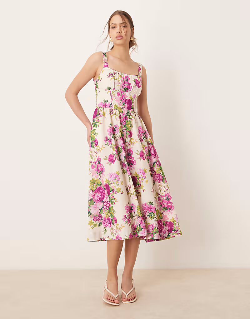 Платье-миди Hope & Ivy А-силуэта с корсетом и бретелями в розовом принте
Платье-миди Hope & Ivy А-силуэта с корсетом и бретелями в розовом принте