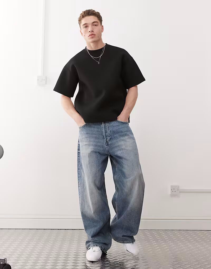 Футболка Weekday premium scuba свободного кроя черного цвета
Футболка Weekday premium scuba свободного кроя черного цвета