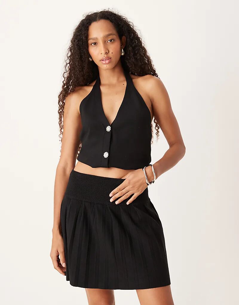 Трикотажная мини-юбка со складками Amy Lynn черного цвета
Трикотажная мини-юбка со складками Amy Lynn черного цвета