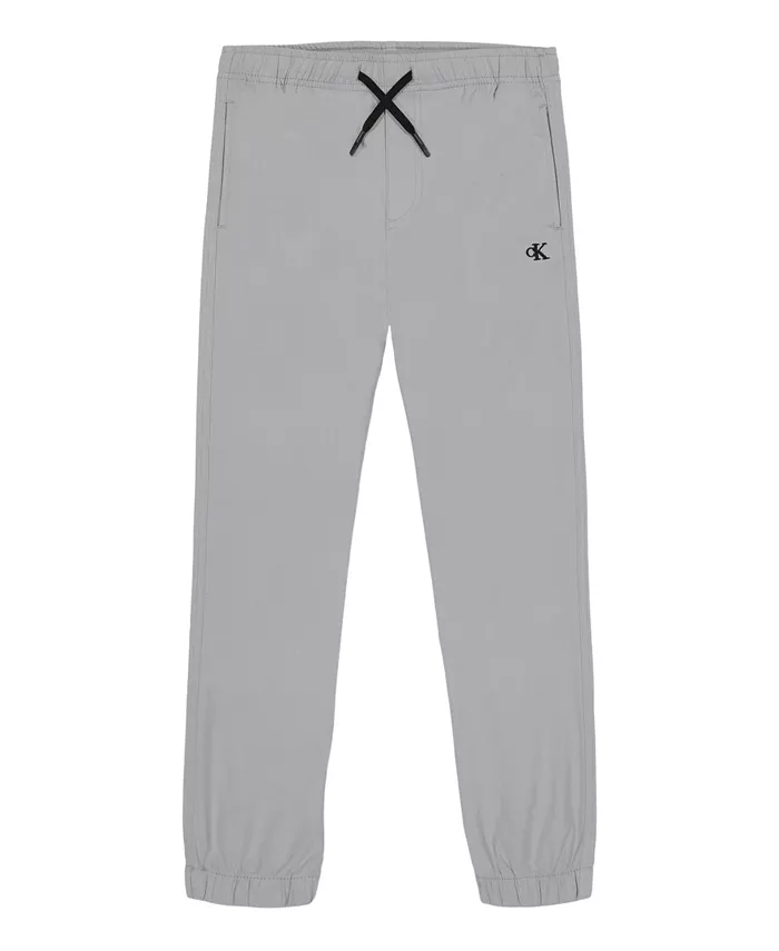 Комфортные эластичные брюки-джоггеры Calvin Klein Big Boys Calvin Klein, серый
Комфортные эластичные брюки-джоггеры Calvin Klein Big Boys Calvin Klein, серый