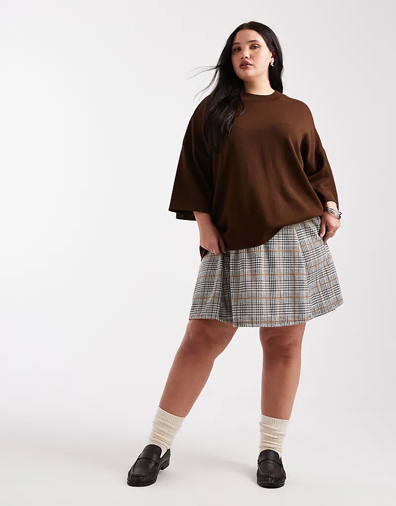 Мини-юбка New Look Curve с струящейся клеткой и черным узором
Мини-юбка New Look Curve с струящейся клеткой и черным узором