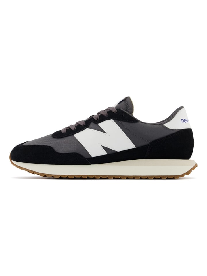 Кроссовки 237 в черном/сером/белом цвете New Balance
Кроссовки 237 в черном/сером/белом цвете New Balance