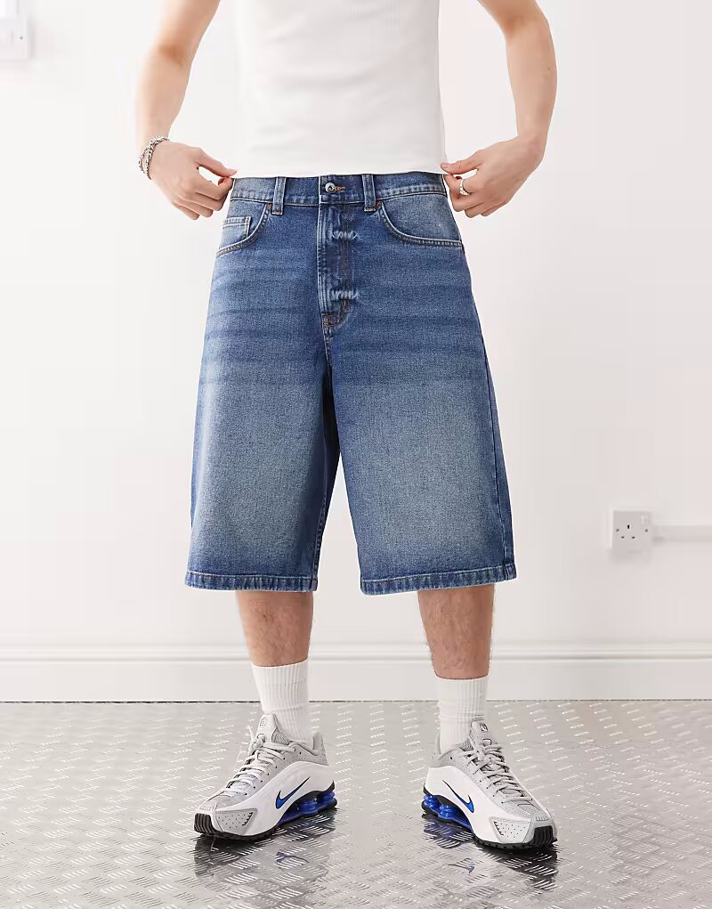 COLLUSION джинсовые шорты для скейтбординга в середине стирки
COLLUSION джинсовые шорты для скейтбординга в середине стирки