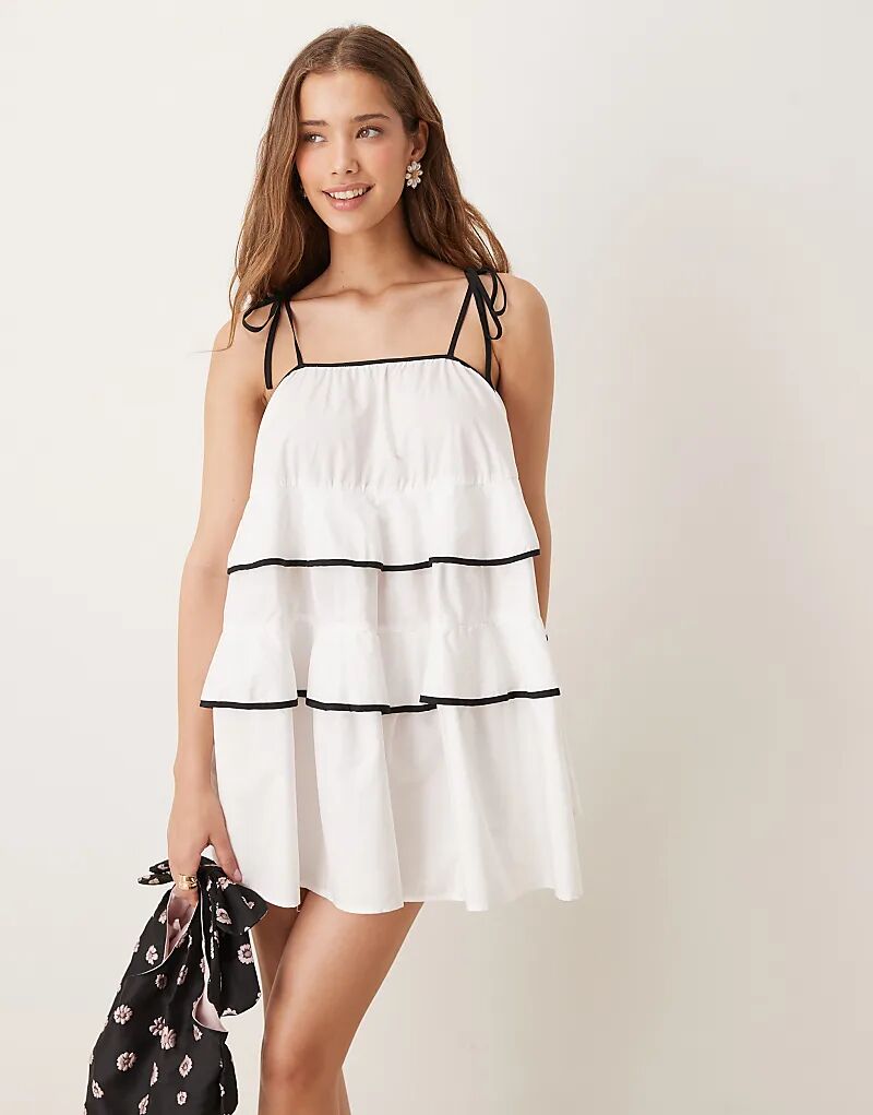 Контрастное мини-платье Sister Jane с многоярусными оборками цвета слоновой кости
Контрастное мини-платье Sister Jane с многоярусными оборками цвета слоновой кости