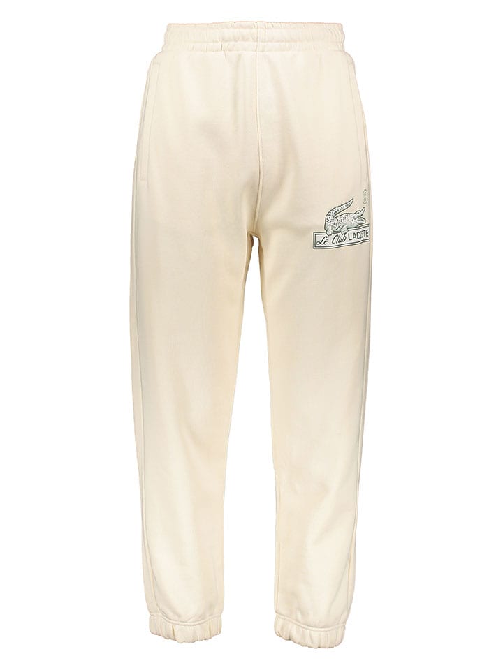 Спортивные брюки кремового цвета Lacoste
Спортивные брюки кремового цвета Lacoste