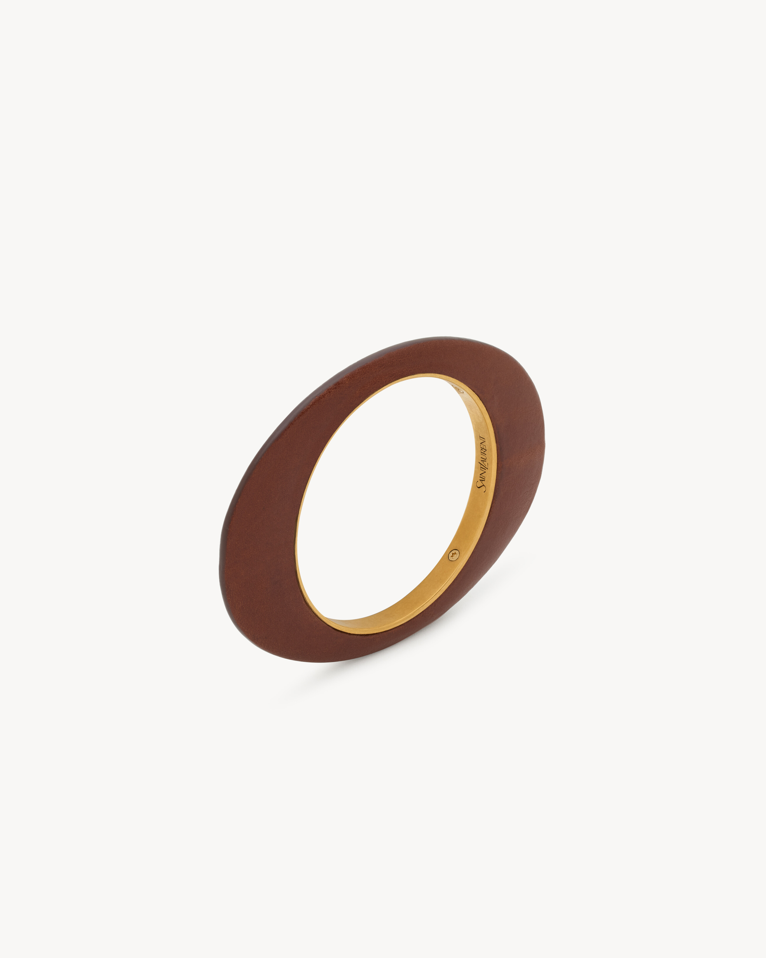 Браслет-кафф из кожи и металла Saint Laurent, коричневый
Браслет-кафф из кожи и металла Saint Laurent, коричневый
