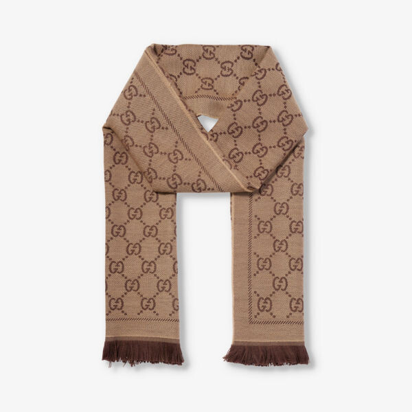 Шерстяной вязаный шарф с бахромой и узором «монограмма» Gucci, коричневый
Шерстяной вязаный шарф с бахромой и узором «монограмма» Gucci, коричневый