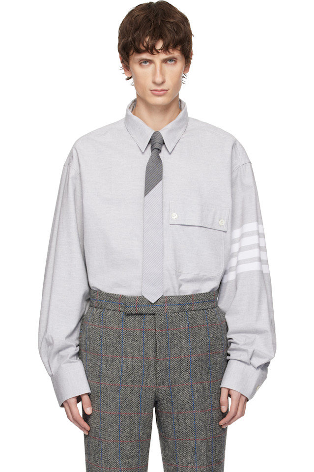 Thom Browne Серая тканая фланелевая рубашка оверсайз с четырьмя полосами
Thom Browne Серая тканая фланелевая рубашка оверсайз с четырьмя полосами