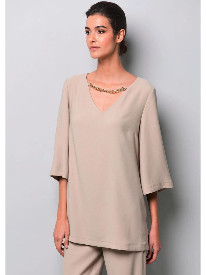 Alba Moda Туника с цепочкой на вырезе, цвета корицы
Alba Moda Туника с цепочкой на вырезе, цвета корицы