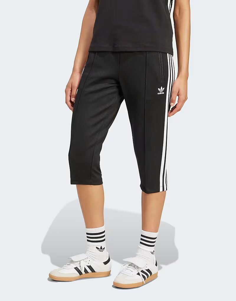 Спортивные брюки-капри Adicolor с тремя полосками черного и белого цветов Adidas Originals
Спортивные брюки-капри Adicolor с тремя полосками черного и белого цветов Adidas Originals