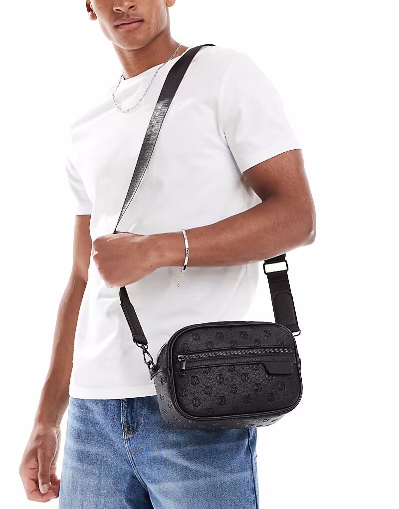 Сумка через плечо из тисненой искусственной кожи ASOS DESIGN черного цвета
Сумка через плечо из тисненой искусственной кожи ASOS DESIGN черного цвета