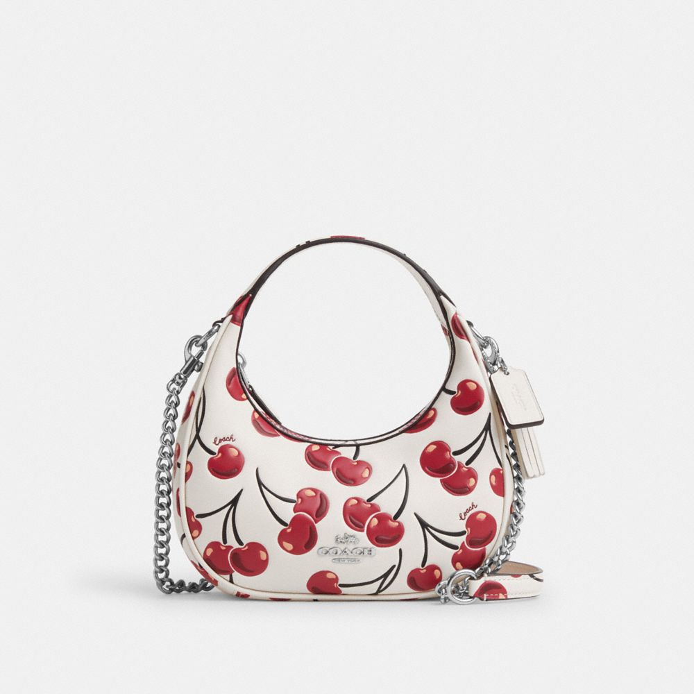 Сумка кросс-боди Coach Carmen Mini Crossbody Bag With Cherry Print, серебряный/мульти
Сумка кросс-боди Coach Carmen Mini Crossbody Bag With Cherry Print, серебряный/мульти
