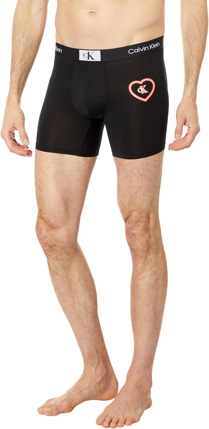 Calvin Klein 1996 V-Day Micro Boxer Brief, Black/Neon Hearts Graphic/Poppy Red
Calvin Klein 1996 V-Day Micro Boxer Brief, Black/Neon Hearts Graphic/Poppy Red