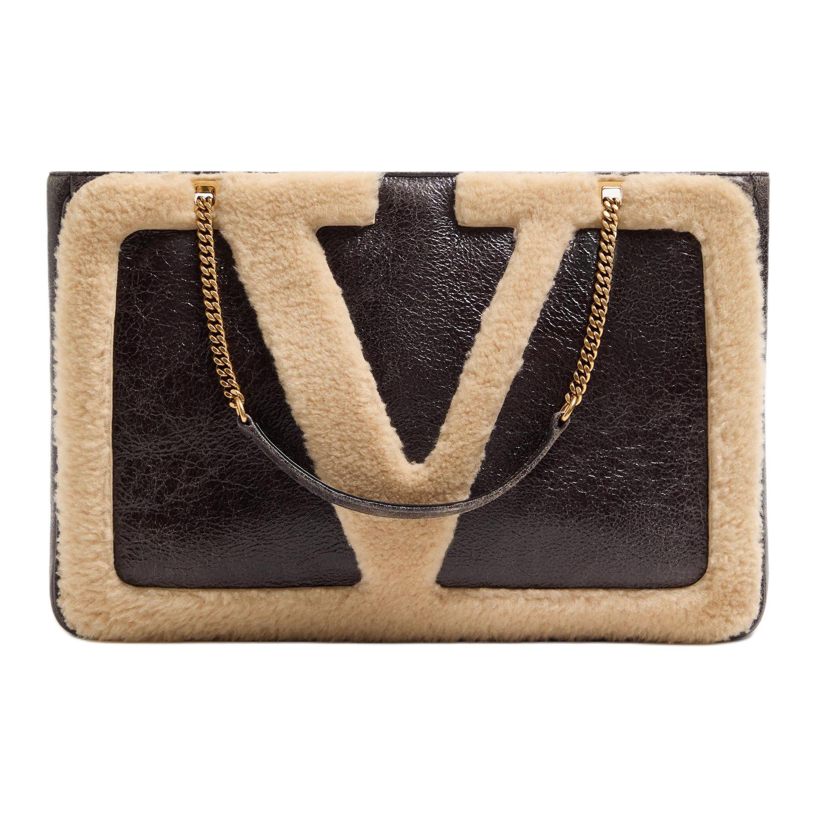 Valentino Средняя женская сумка через плечо шерпа коричневая и бежевая
Valentino Средняя женская сумка через плечо шерпа коричневая и бежевая