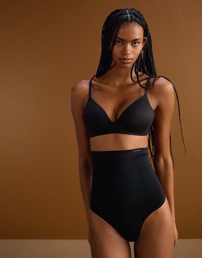 Calvin Klein Shapewear сверхпрочные, надежные, скульптурирующие стринги черного цвета
Calvin Klein Shapewear сверхпрочные, надежные, скульптурирующие стринги черного цвета