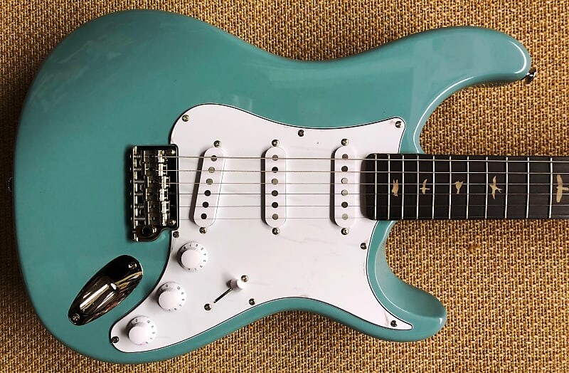 Электрогитара PRS SE Silver Sky Stone Blue
Электрогитара PRS SE Silver Sky Stone Blue