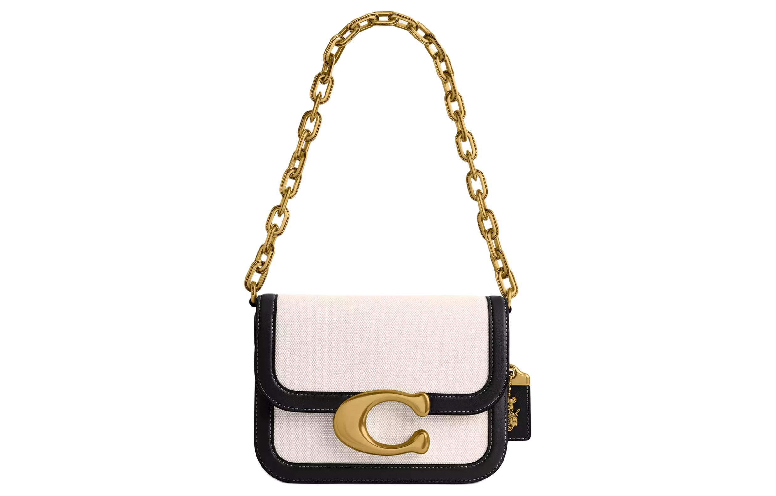 COACH Сумка кроссбоди из натуральной кожи с холщовой отделкой
COACH Сумка кроссбоди из натуральной кожи с холщовой отделкой