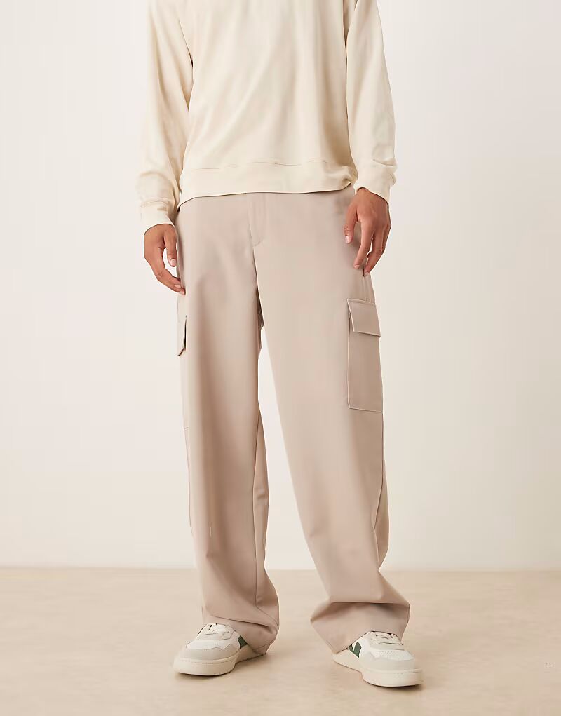 Элегантные брюки-карго широкого кроя с эластичной талией в песочном цвете Asos Design
Элегантные брюки-карго широкого кроя с эластичной талией в песочном цвете Asos Design