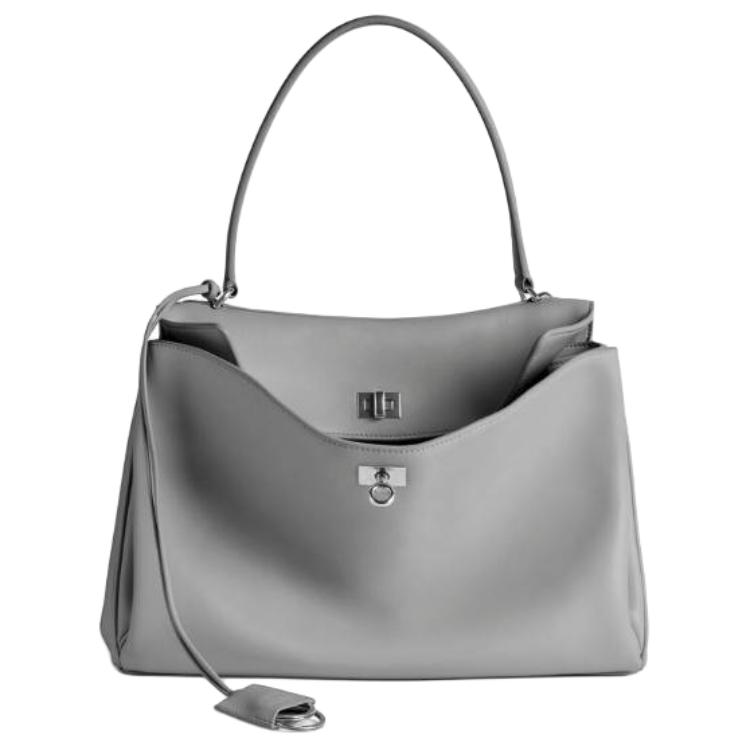 Balenciaga Средняя сумка из телячьей кожи унисекс облачно-серого цвета
Balenciaga Средняя сумка из телячьей кожи унисекс облачно-серого цвета