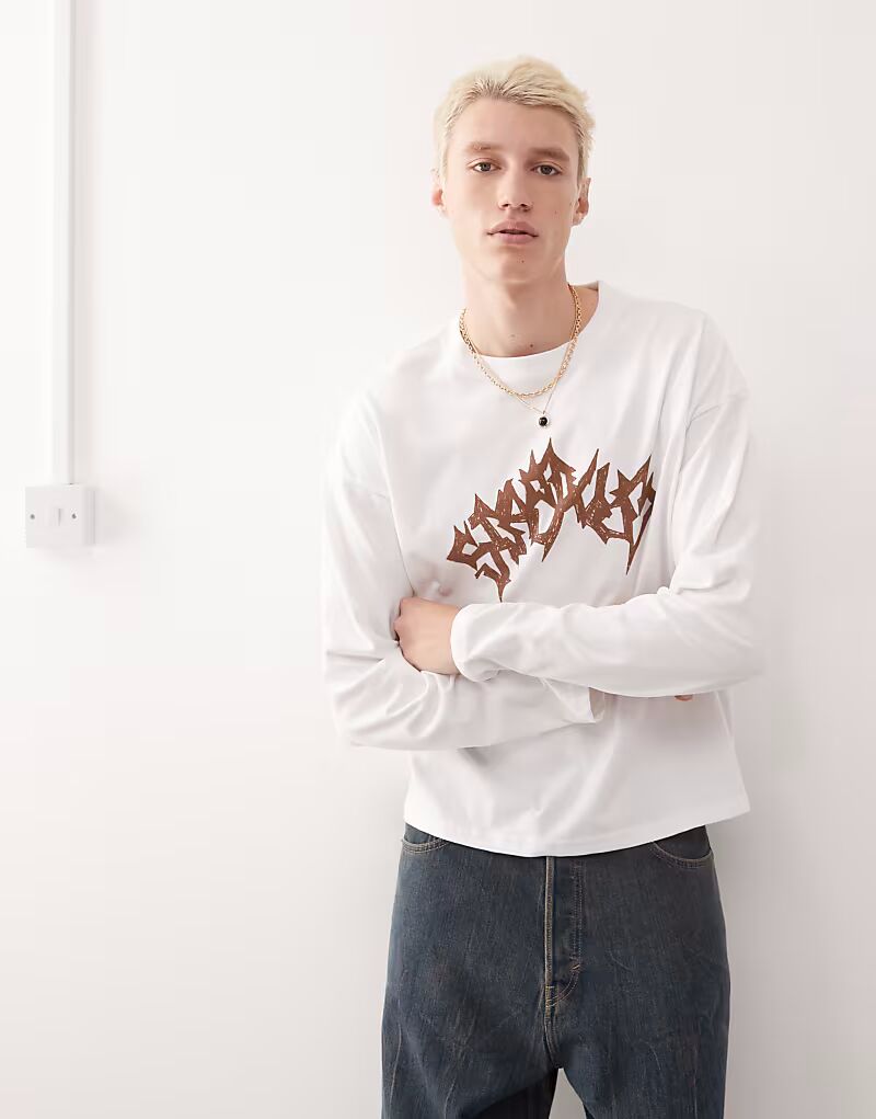 Футболка свободного кроя с длинными рукавами и графическим принтом спереди белого цвета для будних дней
Футболка свободного кроя с длинными рукавами и графическим принтом спереди белого цвета для будних дней