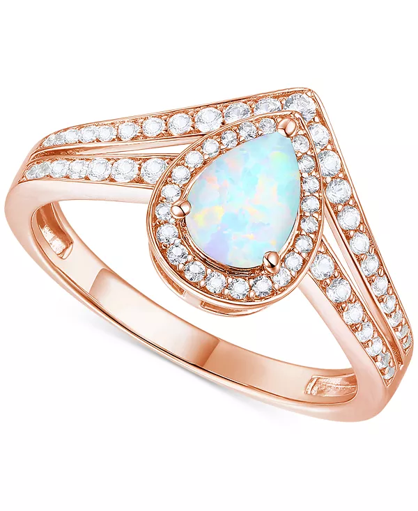 Кольцо с грушевидным ограненным V-образным венчиком из 14-каратного позолоченного серебра с выращенным в лаборатории изумрудом (1/2 карата tw) и выращенным в лаборатории белым сапфиром (1/10 карата tw) (также с другими драгоценными камнями) Macy...
Кольцо с грушевидным ограненным V-образным венчиком из 14-каратного позолоченного серебра с выращенным в лаборатории изумрудом (1/2 карата tw) и выращенным в лаборатории белым сапфиром (1/10 карата tw) (также с другими драгоценными камнями) Macy...