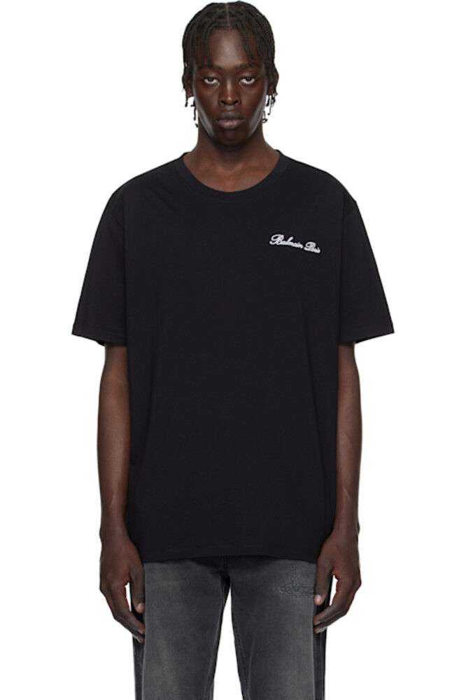 Черная свободная футболка с вышитой подписью «Balmain»
Черная свободная футболка с вышитой подписью «Balmain»