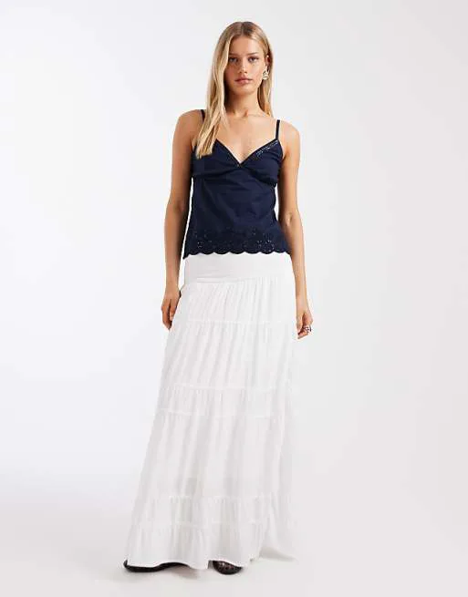 Темно-синий топ с блестящими фестонами Hollister
Темно-синий топ с блестящими фестонами Hollister