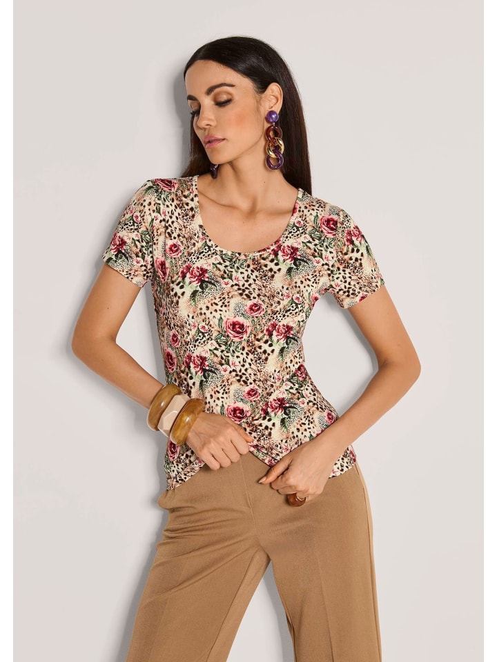 MADELEINE Элегантный топ с романтичным принтом в карамельно-черно-разноцветной гамме
MADELEINE Элегантный топ с романтичным принтом в карамельно-черно-разноцветной гамме