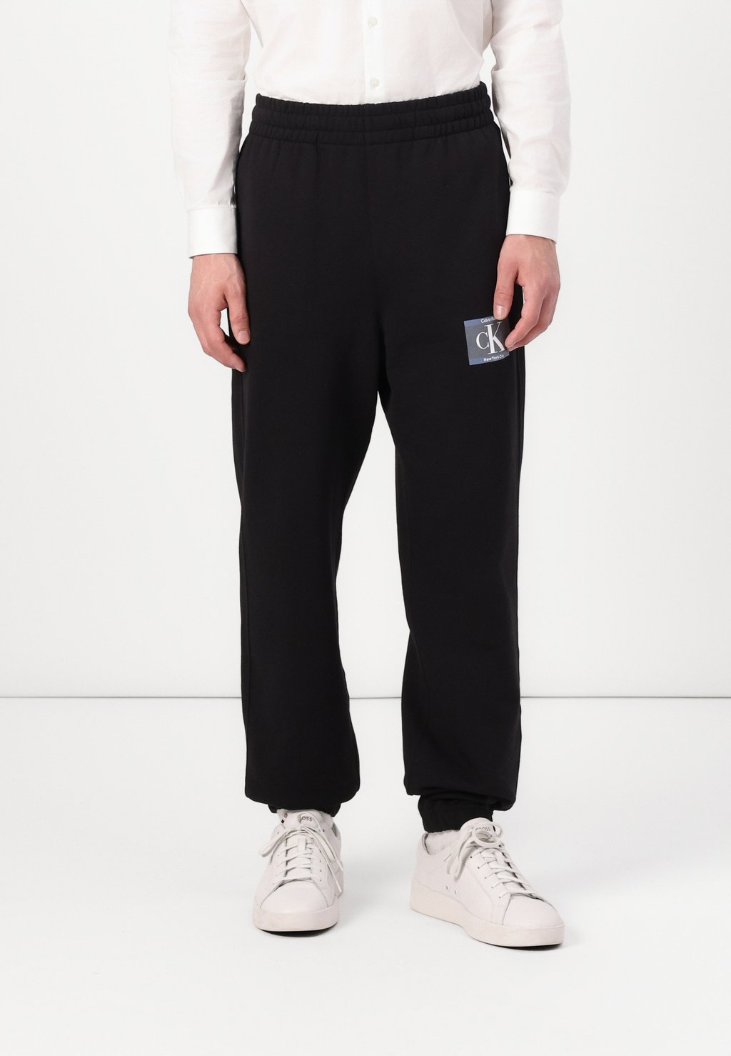 Спортивные штаны UNISEX Calvin Klein, черный
Спортивные штаны UNISEX Calvin Klein, черный