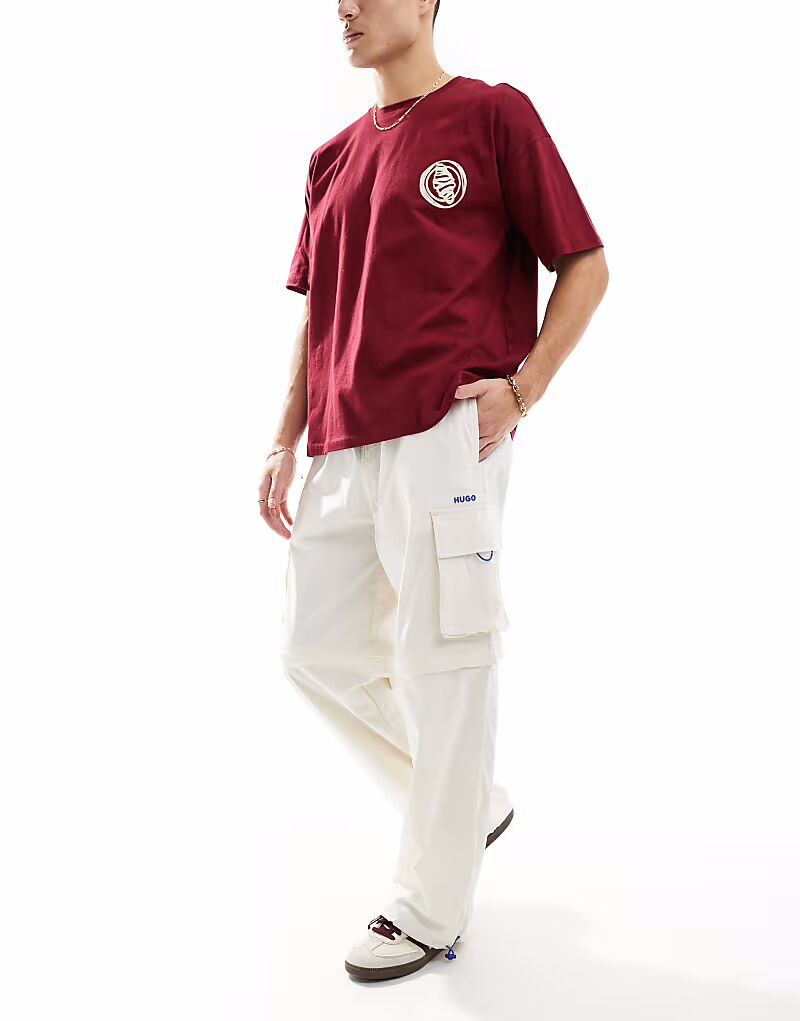 Брюки-карго Hugo Blue мешковатого кроя цвета «кремовый»
Брюки-карго Hugo Blue мешковатого кроя цвета «кремовый»