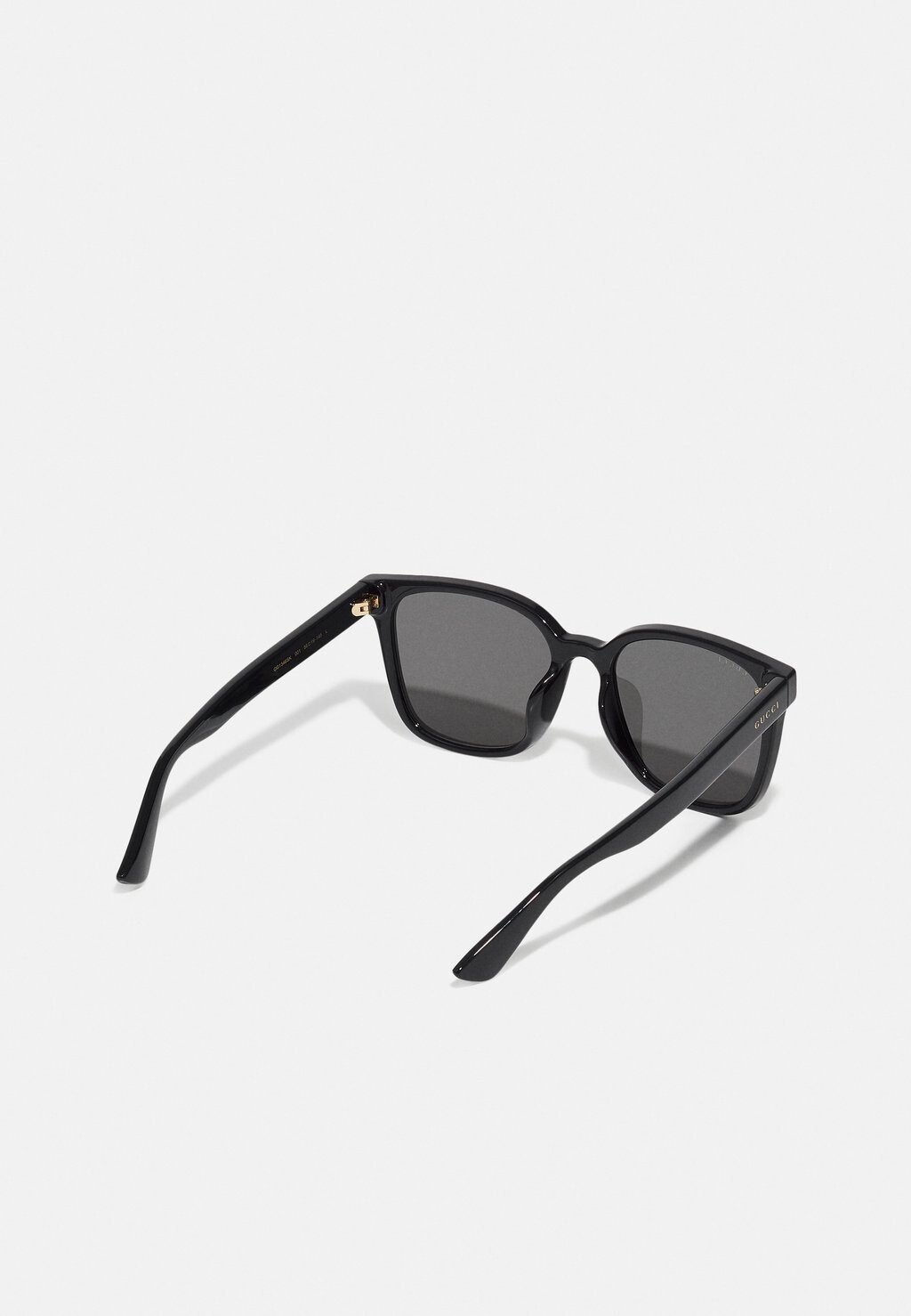 Солнцезащитные очки Unisex Gucci, черный/дымчатый 
Солнцезащитные очки Unisex Gucci, черный/дымчатый